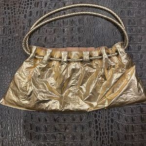Chateau gold bag. Never used